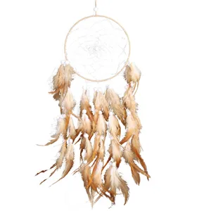 Handmade boho dream catcher wall hanging with natural feathers and wooden beads for home decor.