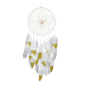 White feather dreamcatcher wall hanging with gold glitter accents for home boho decor.