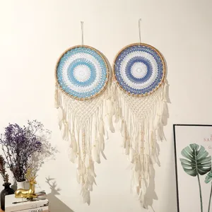 Handmade large dream catcher wall hanging with blue crochet rings and white feather tassels boho.