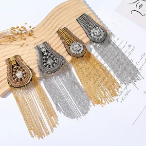 Detailed view of ornate rhinestone fringe shoulder epaulets, perfect for DIY suit and dress decoration.