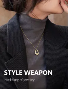 Gold minimalist pendant necklace detail shot, elegant irregular shape design for autumn.