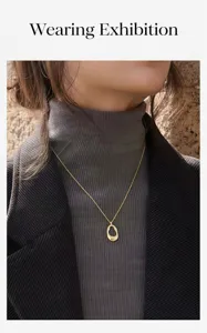 Minimalist gold irregular geometric pendant necklace detail, elegant female collarbone chain.