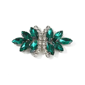 Green rhinestone bow detail, sparkling crystal buckle for apparel and shoe decoration.