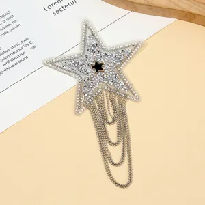Detail view of rhinestone star epaulet patch, sparkling crystal DIY costume accessory.