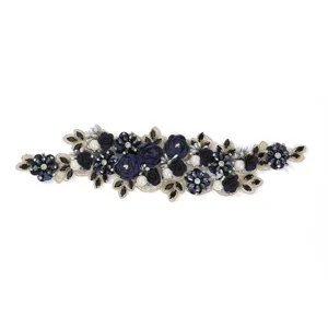 Detailed view of dark blue 3D floral lace patch with beading and rhinestones for DIY dresses.