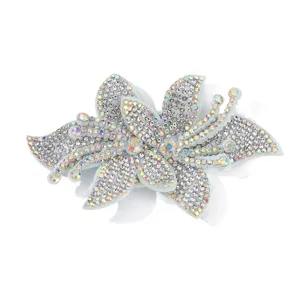 Detailed view of the sparkling rhinestone orchid patch, perfect for DIY fashion and accessories.