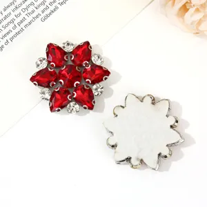 Detailed view of six petal rhinestone flower patch with felt backing for DIY crafts apparel.