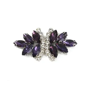 Exquisite purple and clear rhinestone bow apparel accessory, perfect for clothing and shoes.