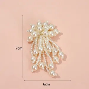 Detailed shot of DIY pearl flower tassel patch, clothing accessory decoration, 7x6cm.