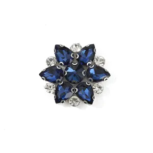 Detail view of sparkling blue crystal rhinestone flower patch, ideal for DIY shoe and apparel.