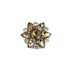 Close-up of sparkling crystal rhinestone flower patch, glass gem craft accessory.