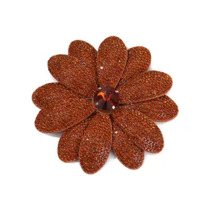 Brown rhinestone flower shoe patch detail close-up sparkling crystal accessory decor