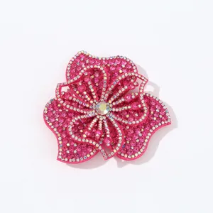 Sparkling rhinestone flower patch detail, multi-layer crystal applique for DIY crafts.