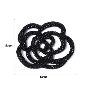 Black beaded camellia flower fabric patch DIY handmade decorative applique for clothing and hats.