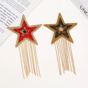 Detailed view of sparkling rhinestone star patches with cascading tassel chains for DIY crafts.