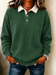 Ribbed long sleeve polo shirt detail featuring contrast collar and front button placket.