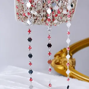 Silver rhinestone diamond shaped chain detail shot for DIY crafts, hair accessories and decor.