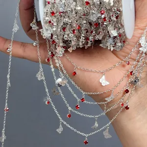 Silver DIY jewelry chain roll featuring sparkling red rhinestones and delicate butterfly charms.