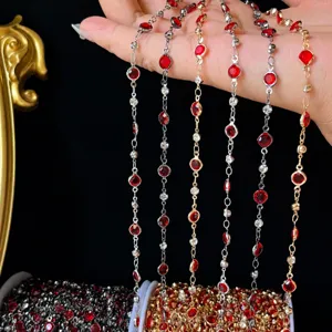 Close-up detail of 6mm red glass stone metal chains for handmade DIY jewelry crafting.