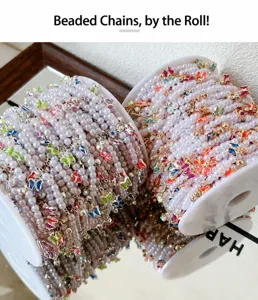 DIY pearl beaded chain trim with colorful crystal butterfly charms for clothing sewing.