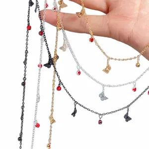 DIY metal chains with red rhinestones and butterfly pendants for jewelry and bag accessories.