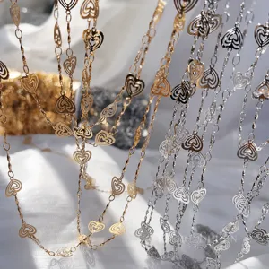 Gold and silver hollow heart chains DIY jewelry accessories, delicate twisted metallic links.