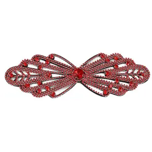 Red rhinestone patch detail view, sparkling glass crystal DIY clothing accessory trim close up.