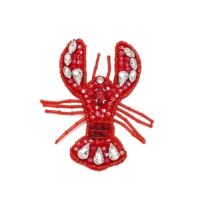 Toppa ricamata con perline di astice rosso fatta a mano strass accessorio abbigliamento