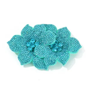 Sparkling blue rhinestone double flower shoe clip for DIY bridal footwear and apparel decoration.