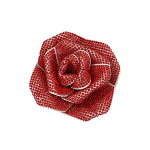 Exquisite rhinestone red rose flower brooch detail for elegant women garment accessory.