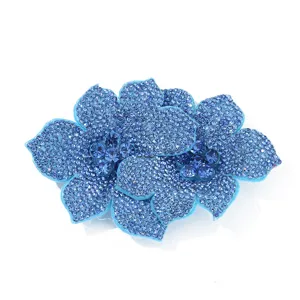 Exquisite blue rhinestone double flower shoe clip detail, sparkling crystals for DIY crafts.