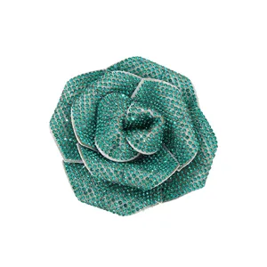 Exquisite teal rhinestone rose brooch, sparkling crystal flower apparel accessory for women.