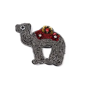 Handmade beaded sequin camel patch DIY decorative fabric applique for bags and clothing.
