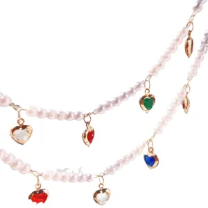 Double layer faux pearl chain with colorful crystal heart pendants for DIY jewelry crafting.