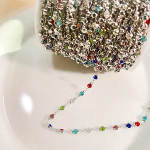 Detailed view of sparkling multi-color crystal rhinestone claw chain for DIY jewelry making.