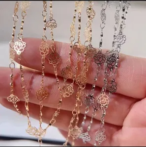 Close-up of hollow rose metal chains, twist design, perfect for DIY jewelry and necklaces.