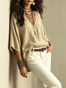 Haut de dame ample uni avec col en V vue détaillée, parfait style de mode quotidienne.