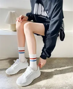 Spring casual women's tube socks with stylish double stripes, breathable and comfortable daily wear.