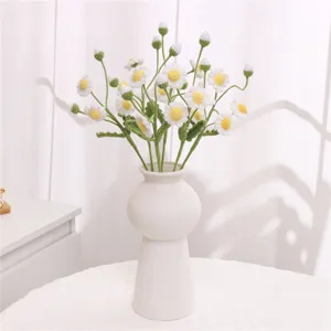 Handcrafted knitted daisy flower bouquet in white ceramic vase for home decor table centerpiece