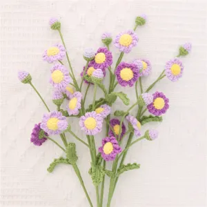 Handmade knitted wool daisy flower detail, perfect for home decor and floral arrangements.
