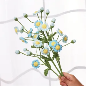 Handcrafted crochet daisy flower bouquet detail, lovely knitted yarn floral home decor accessory.
