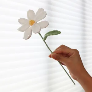 Handmade crochet white daisy artificial flower detail view for home and office decoration.