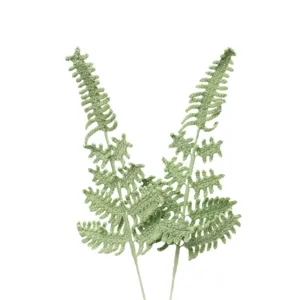 Handcrafted crochet fern leaf green plant branch for home floral arrangement decor.