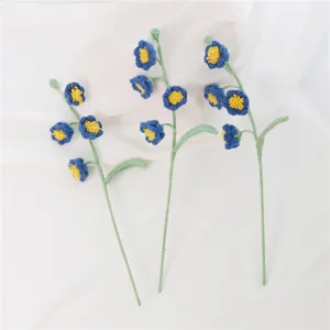 Handmade crochet flower bouquet knitted blue flowers detailed shot for home decor gift showing.
