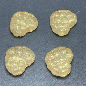 Gold glitter waffle heart beads for DIY jewelry making, phone charms, and keychains crafting.