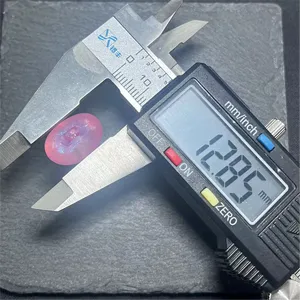 Close-up measurement detail of pink acrylic loose bead, showing size with a digital caliper.