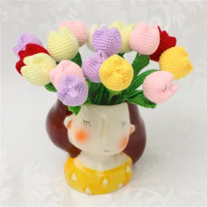 Handmade mini crochet tulip bouquet in a cute ceramic vase, perfect knitted yarn home decor gift.