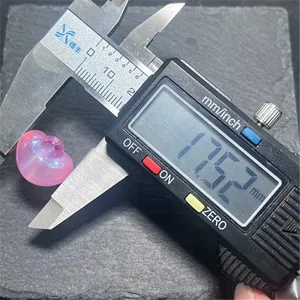 Acrylic heart bead detail close-up showing precise 17.52mm size measurement with digital caliper.