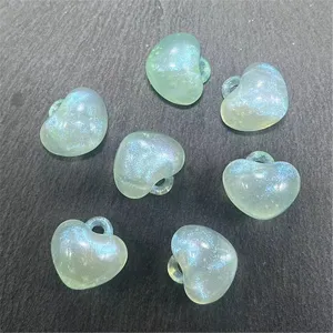 Acrylic mermaid luminous puffy heart charm detail view, ideal for DIY phone chain and crafts.