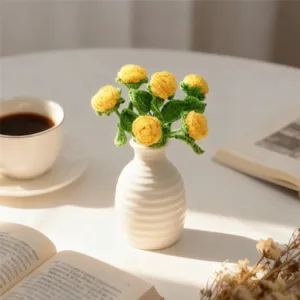Handmade crochet yellow mini roses detail shot, exquisite woven floral decor for cozy home.